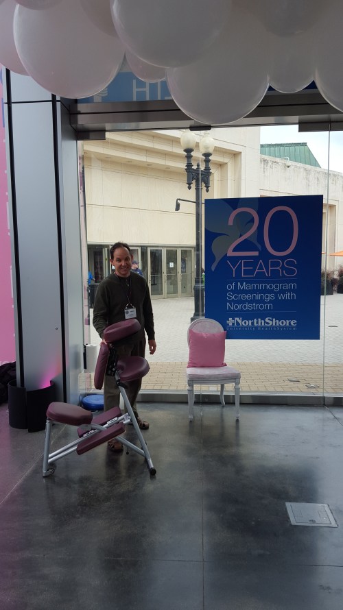 Andrew from Working Well Massage stands ready to give massages!